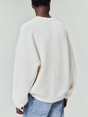 back view of men's off-white double knit linen wool cotton crewneck sweater with relaxed fit and ribbed detailing