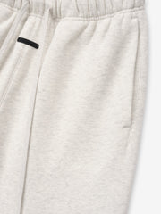 off-white women's relaxed silhouette classic flare sweatpants in 380GSM core fleece with elastic waistband and embroidered Essentials logo