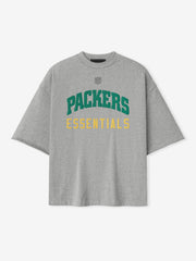 Front view of concrete heather Packers 90s 3/4 Sleeve Football Tee with green Packers and yellow Essentials text centered