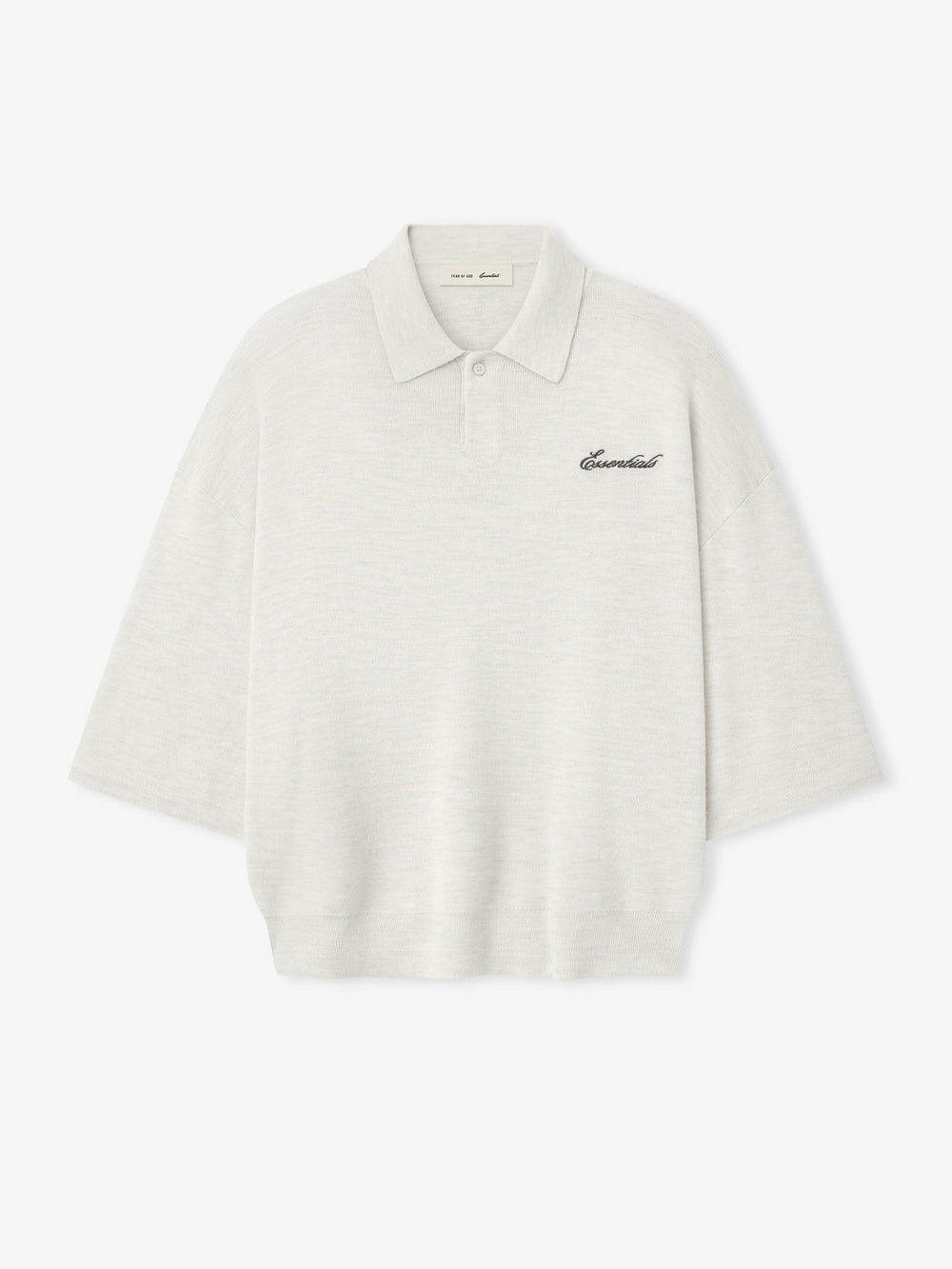 off-white heavy merino knit polo with 3/4 sleeves, relaxed fit, classic collar, and black Essentials script embroidery on chest