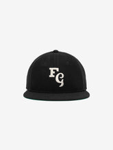 Black fitted cap featuring bold white embroidered "FG" letters on the front panel with a structured crown and flat brim, Fear of God Essentials 59FIFTY Retro Fitted FG Cap.