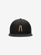 Fear of God Essentials 59FIFTY Athletics Cap featuring a solid black crown with a bold orange minimalist emblem on the front panel and a structured flat brim.