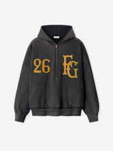 Off-black washed cotton half-zip hoodie with gold "26" and stylized "FG" text on front and ribbed cuffs and hem