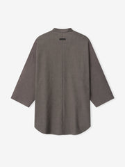back view of relaxed fit cotton-wool oxford shirt with mandarin collar and long sleeves in muted brown tone
