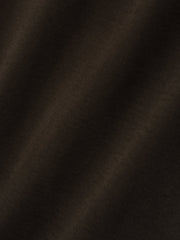 close-up of dark brown heavyweight cotton fleece fabric with soft texture and vintage garment wash finish