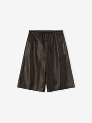 baggy knee-length women's shorts made from dark full-grain calfskin leather with elastic drawstring waistband