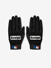 Pair of Franklin Pro Classic Black gloves crafted from breathable textured fabric with Fear of God branding on the back and MLB logo on adjustable wrist straps.