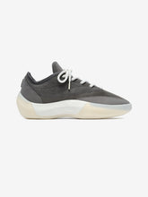 Athletics III Basketball shoe featuring a streamlined silhouette with a charcoal knit upper, off-white cushioned midsole, and rounded toe for lightweight and stylish footwear.