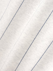 Close-up of a white fabric with blue stripes