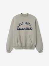 Mlb Sport Crewneck in a muted gray tone featuring navy blue "Baseball Essentials" script on the chest, ribbed cuffs and hem, and a front kangaroo pocket for comfortable casual wear.