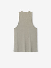 Essential Tank in a soft muted taupe hue with a sleeveless cut and wide armholes, designed for a relaxed fit and comfortable casual layering top.