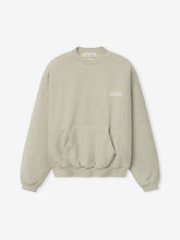 90s Sweatshirt in a soft washed vanilla heather shade, featuring a relaxed fit, ribbed cuffs and hem, front kangaroo pocket, and small contrasting chest text for casual tops.
