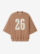 3/4 Sleeve Crewneck in a warm ginger tone featuring wide sleeves and a relaxed fit, with bold white "26" printed on the front for a sporty, casual style.