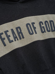 Kids Cropped Relaxed Panelled Hoodie in dark grey with a wide light grey horizontal panel across the chest featuring raised "Fear of God" lettering, designed as stylish kids outerwear.