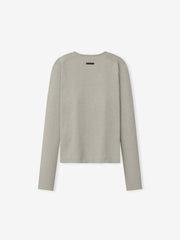 Womens Soft Knit Slim Longsleeve in a soft neutral shade, crafted from finely knit fabric with a tailored slim fit and a minimalistic design for versatile casual tops.