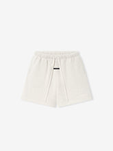Essentials FW26 Classic Sweatshort in off white with elastic drawstring waistband black cord lock relaxed fit and clean hem shown against a plain background Bottoms