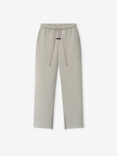 Essentials FW26 Classic Trackpant in light gray with an elastic waistband drawstrings zip hems and straight legs displayed against a white background