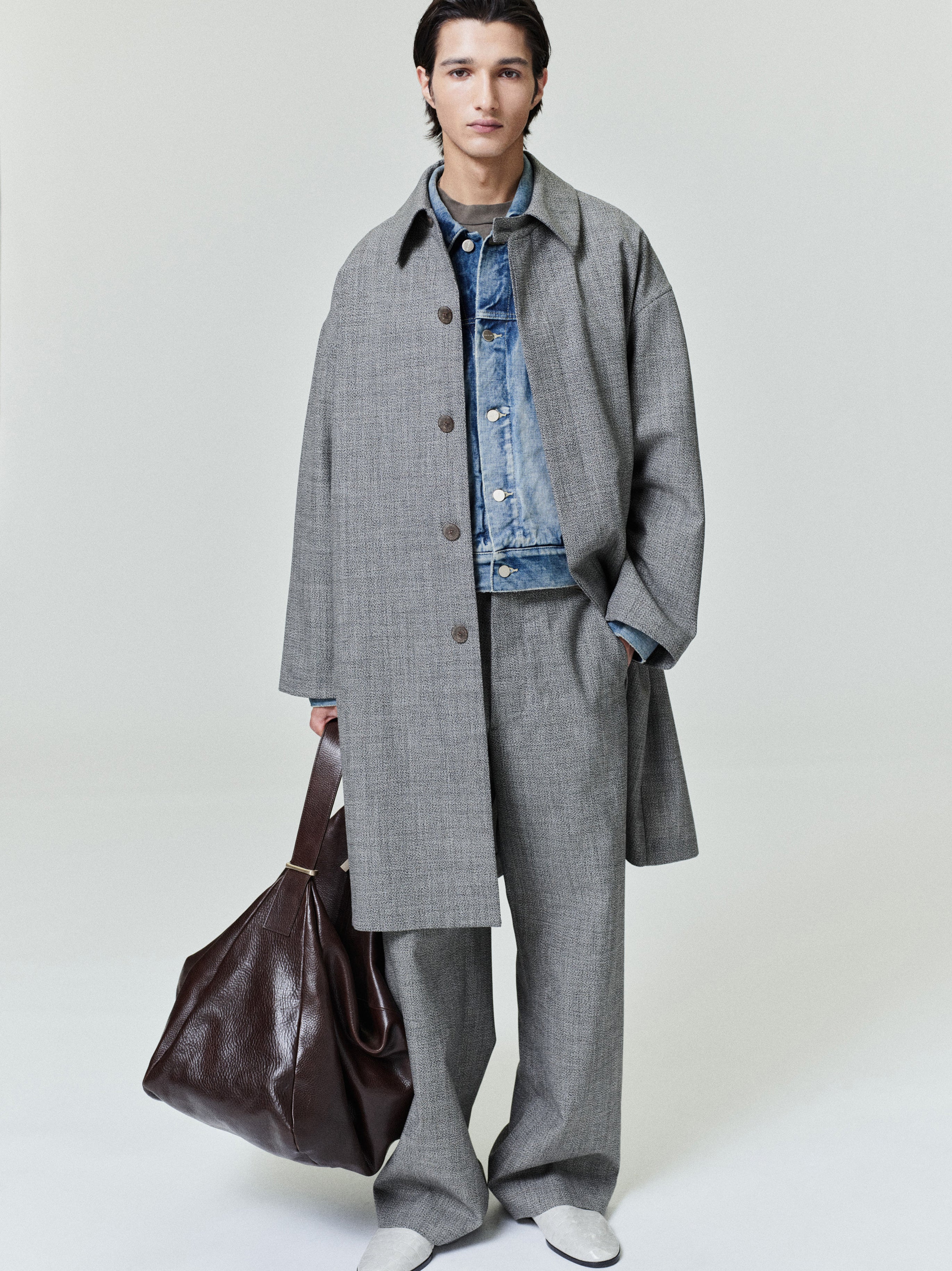 men’s loose-fit mouliné wool pants in light gray with side pockets and relaxed silhouette