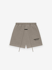 taupe Essentials sweatshorts made from thick core fleece with elastic waistband and Fear of God logo on leg