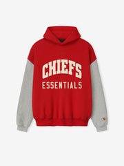 Front view of red Chiefs Sport Hoodie with grey sleeves and large cream Chiefs Essentials text on chest