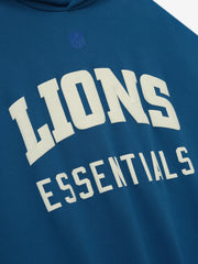 Close-up of blue sapphire Lions Sport Hoodie front showing large white Lions Essentials text and subtle tone-on-tone NFL logo above