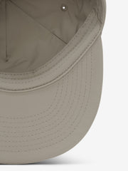 5 Panel Nylon Hat in a soft neutral shade with detailed topstitching on the curved brim and a smooth interior lining for lightweight, comfortable casual wear.