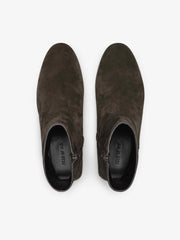 Suede Ankle Boot showcasing a dark brown suede upper with a streamlined almond toe, side zipper closure, and subtle inner branding for contemporary and versatile footwear style.