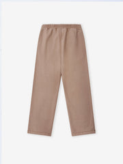 sunfaded beige wide leg sweatpants made from heavyweight cotton fleece with elastic waistband and relaxed fit