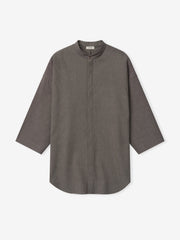 brown cotton-wool oxford shirt with mandarin collar, relaxed fit, long sleeves, and concealed button placket on white background