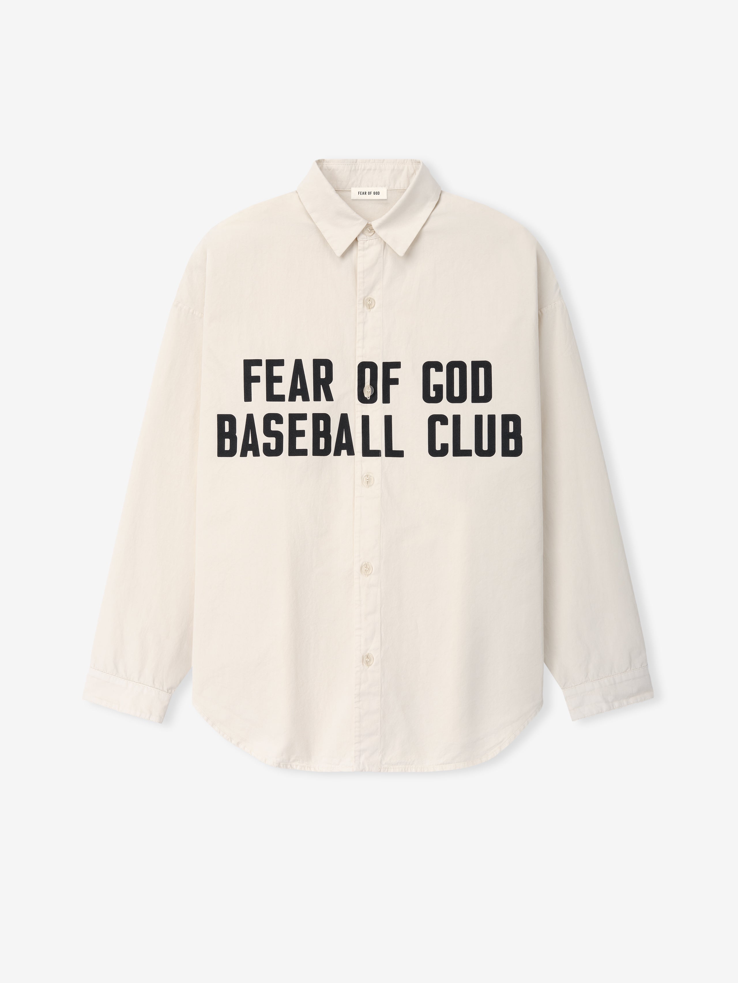 Cream-colored long-sleeve shirt with button front and bold black text print across the chest