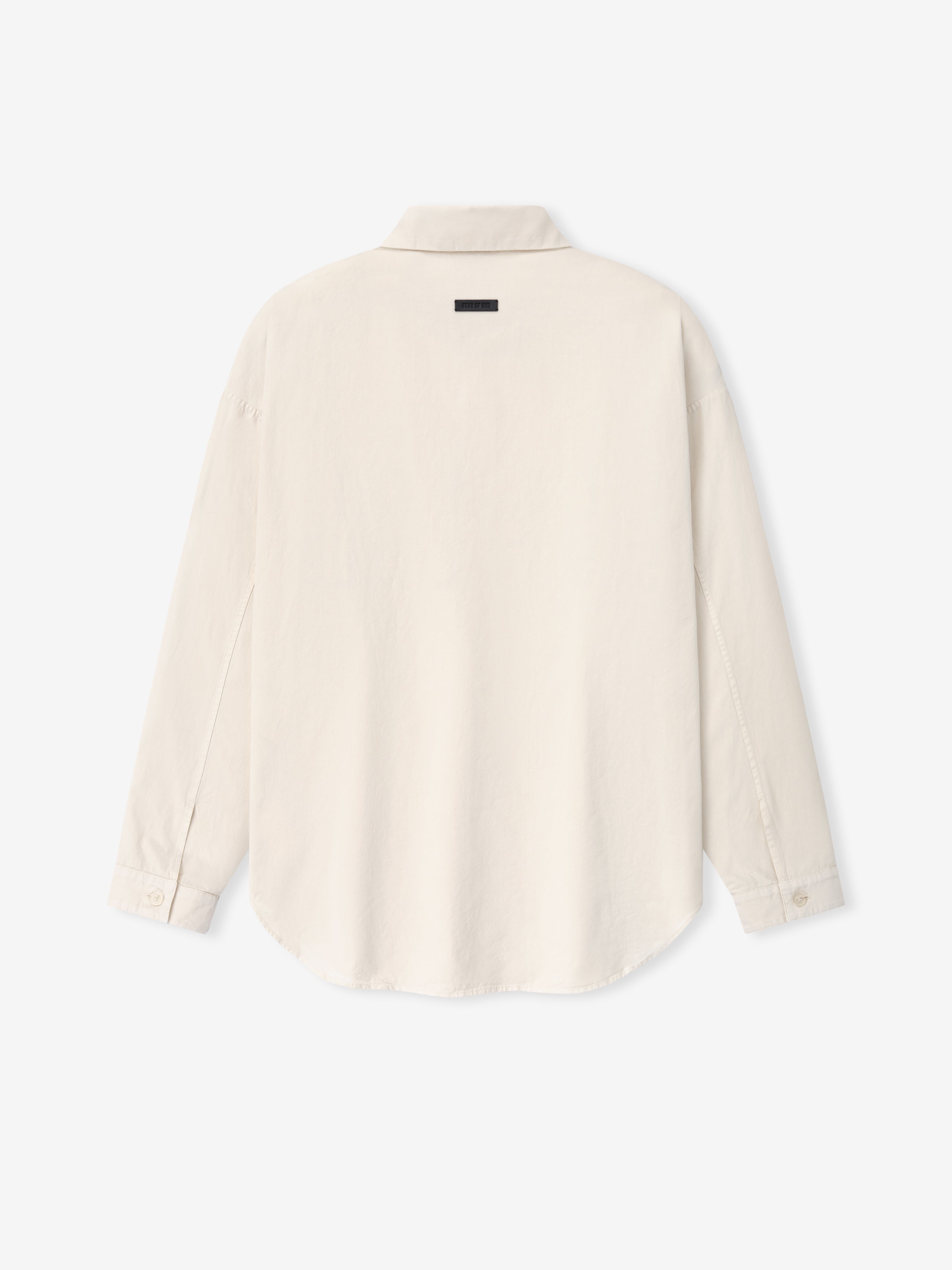 Back view of a natural-colored long-sleeve shirt with buttoned cuffs and a small black label near the collar