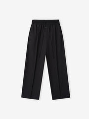 black striped wide-leg wool pants with elastic waistband and long adjustable drawstring detail on flat lay