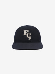 black textured wool baseball cap with white felt FG stitched logo on front and adjustable elastic back band