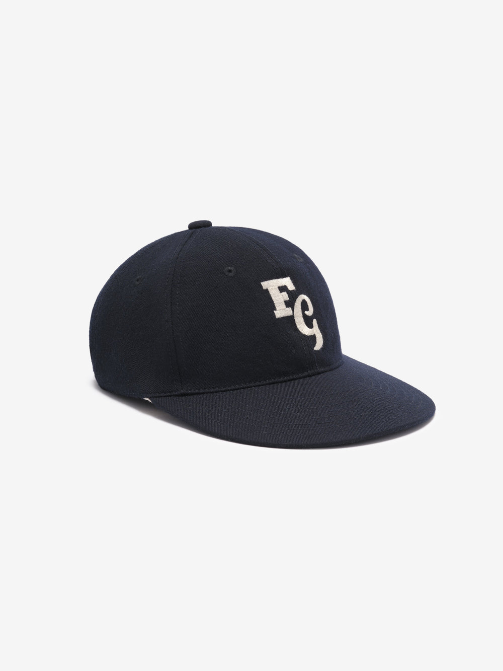 navy textured wool baseball cap with white felt FG stitched logo and elastic adjustable back strap