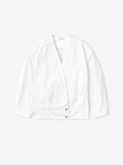 optic white washed cotton broken twill relaxed lapelless jacket with two snap button closure