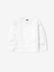 back view of optic white cotton broken twill relaxed lapelless denim jacket with deep pleats and snap buttons