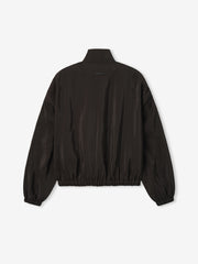 back view of black lightweight technical crinkle viscose track jacket with elasticated cuffs and waistband