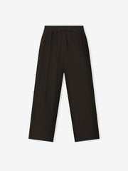 black womens loose-fit worker pants with high waist and straight leg design on plain light background