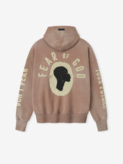 Back view of dune pearl Liberation Now Hoodie with black profile graphic and cream "FEAR OF GOD" text FGDSYF-FLC004U gallery 0