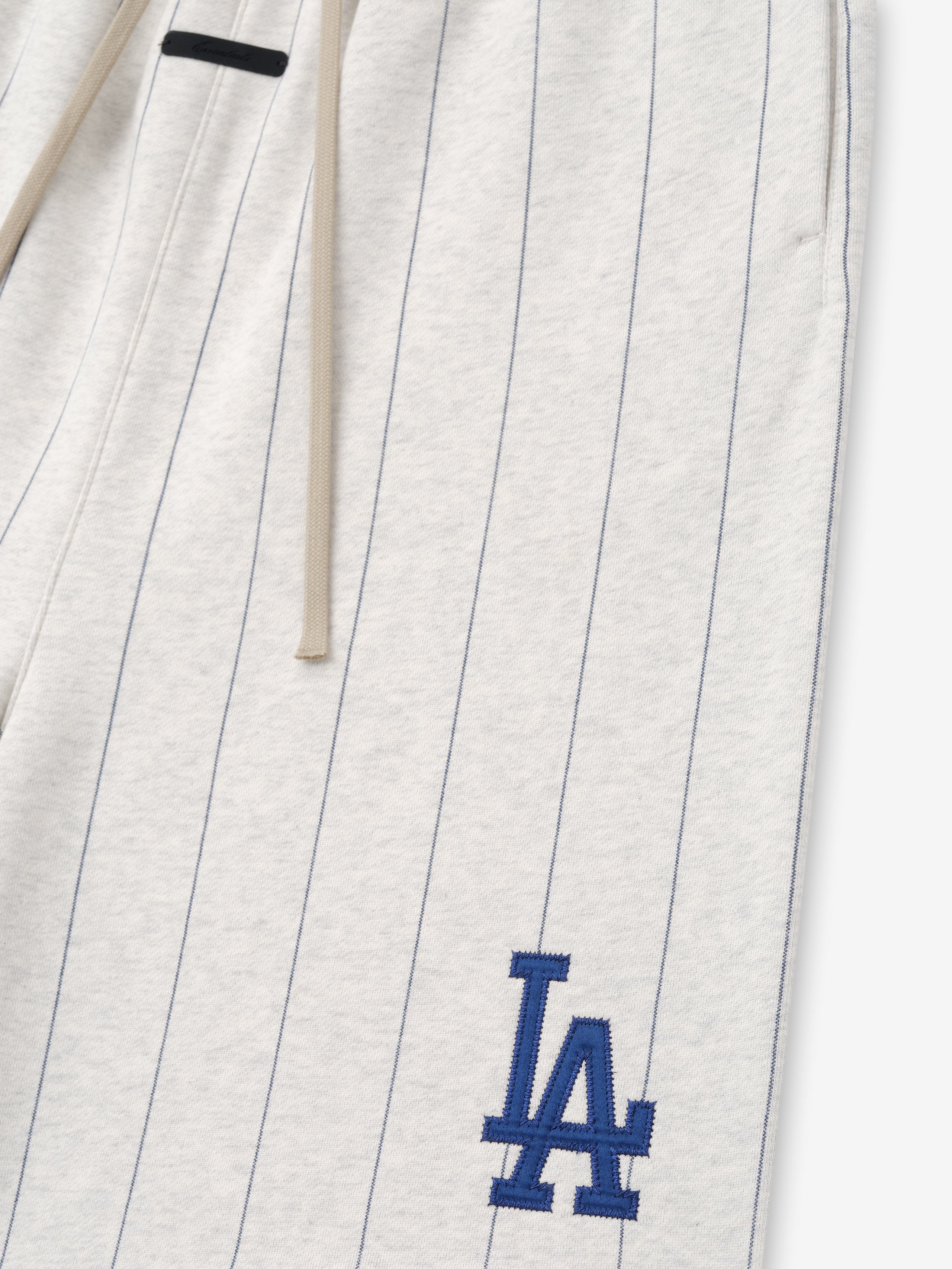 White sweatshirt with blue LA logo on a white background