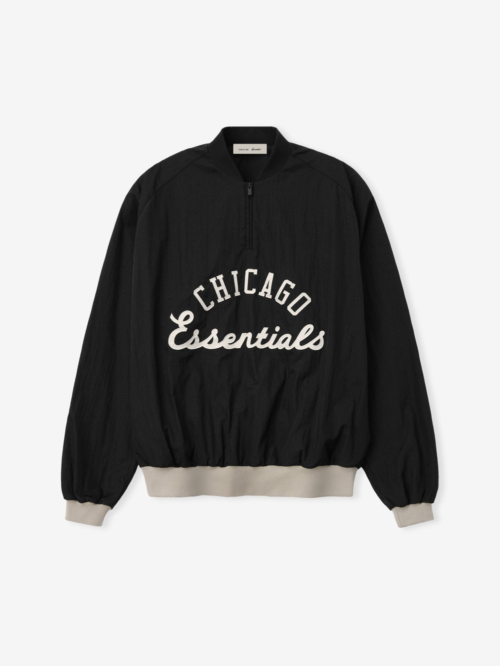 White Sox Half Zip Pullover in black with white "Chicago Essentials" script on the front, featuring beige ribbed cuffs and waistband for a relaxed fit outerwear top.