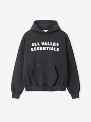 90s Hoodie in washed dark grey featuring bold white text "ALL VALLEY ESSENTIALS" across the chest, with a roomy kangaroo pocket, ribbed cuffs, and relaxed fit.