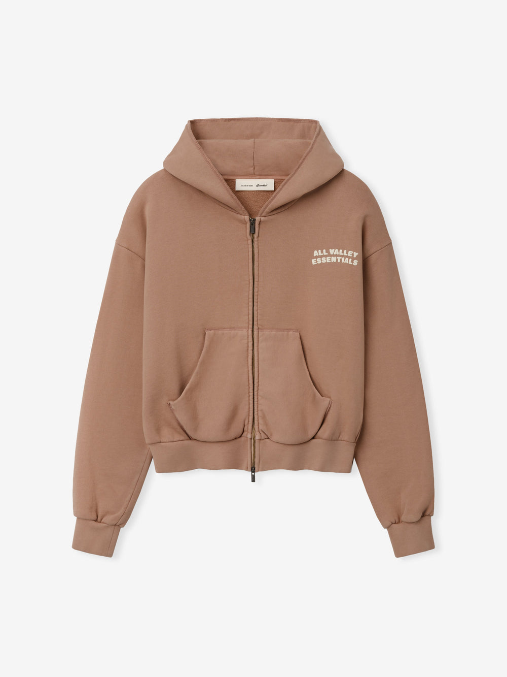 Womens 90s Full Zip Hoodie in a muted ginger tone featuring a relaxed fit, front pockets, ribbed cuffs, and subtle white text on the chest for casual outerwear style.