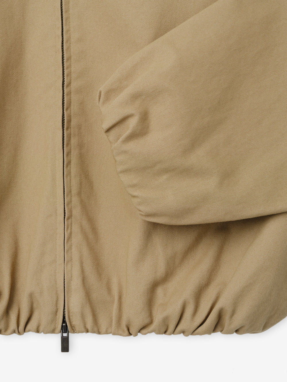 Womens Cotton Twill Work Jacket in a warm dune tone showcasing elasticized cuffs and hem with a full front zipper for functional and stylish outerwear layering.