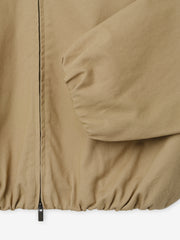 Womens Cotton Twill Work Jacket in a warm dune tone showcasing elasticized cuffs and hem with a full front zipper for functional and stylish outerwear layering.