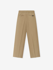 Womens Cotton Twill Pleat Front Drawstring Pant in a soft dune color, featuring back welt pockets, an elastic waistband with drawstring, and a relaxed straight leg fit for versatile bottoms.