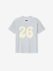 Womens Tri-Blend Classic Fit Tee in a soft overcast gray shade featuring a large cream-colored number 26 graphic on the back with a relaxed silhouette for casual everyday wear.