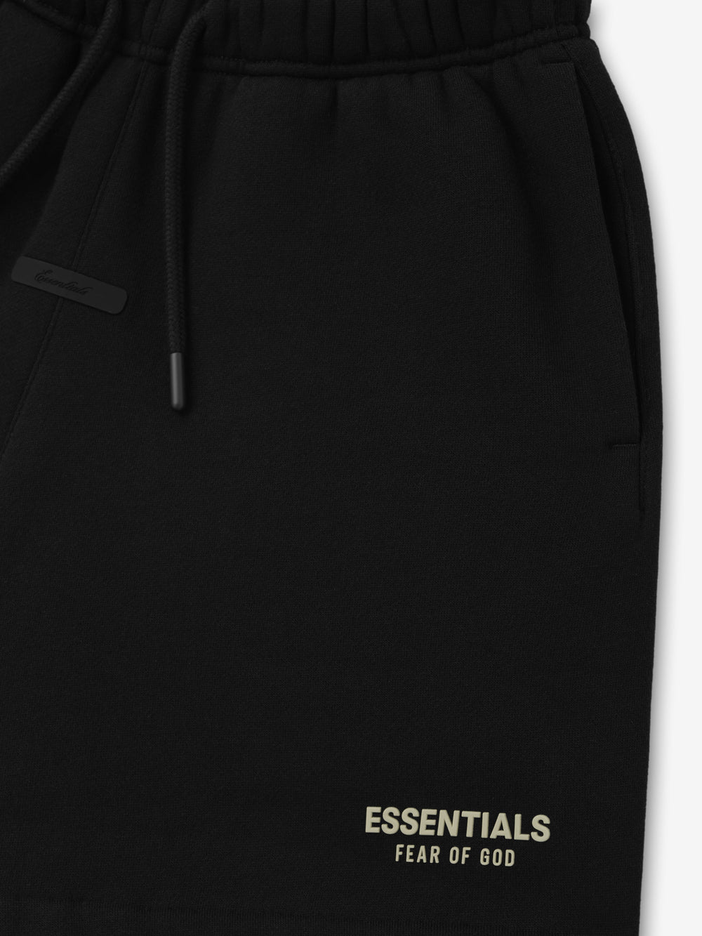 Kids FW26 Classic Sweatshort in black with elastic waistband drawstring side pocket and Essentials Fear of God logo detail Bottoms