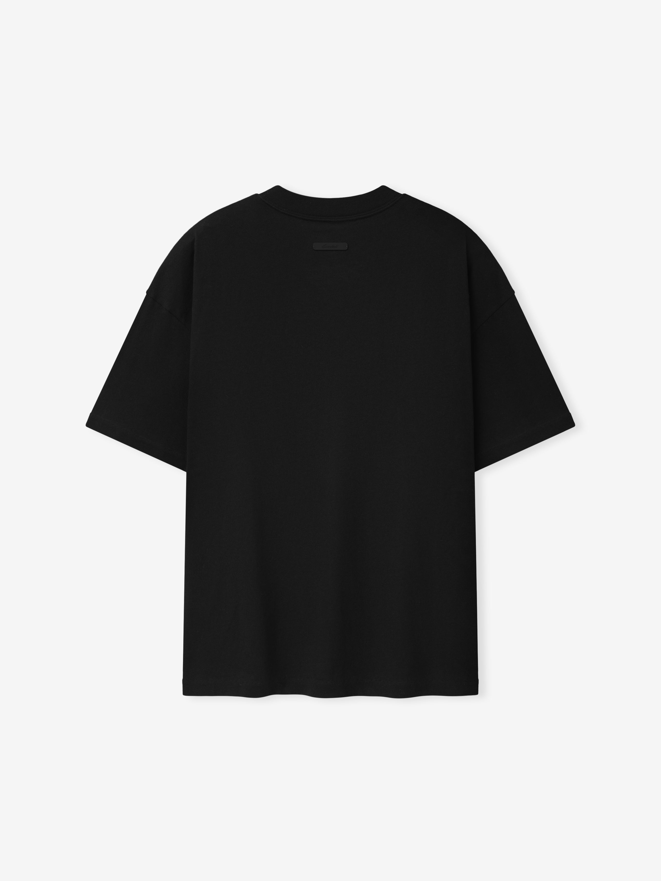 Essentials FW26 Classic Tee in black shown flat with short sleeves crew neckline and subtle tonal Fear of God chest logo Tops