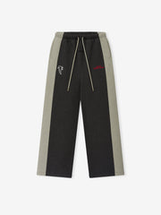Falcons Lounge Sweatpant in black fleece with gray side panels elastic drawstring waist embroidered Falcons logo and straight leg silhouette shown as a Bottoms product view